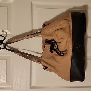 Kate Spade tan and black shoulder bag.